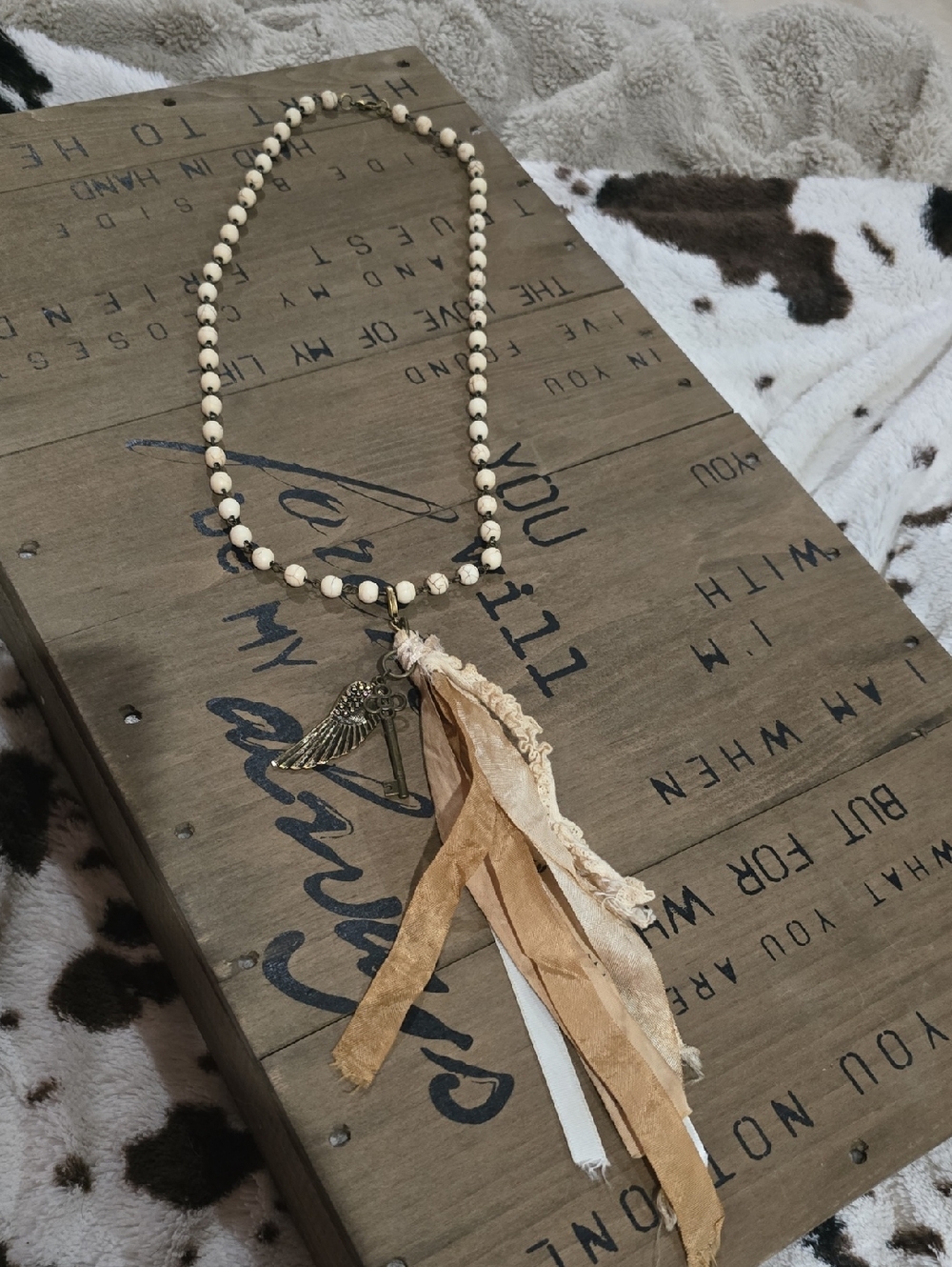 Boho Cream Beaded Tassel Necklace with Wing Charm